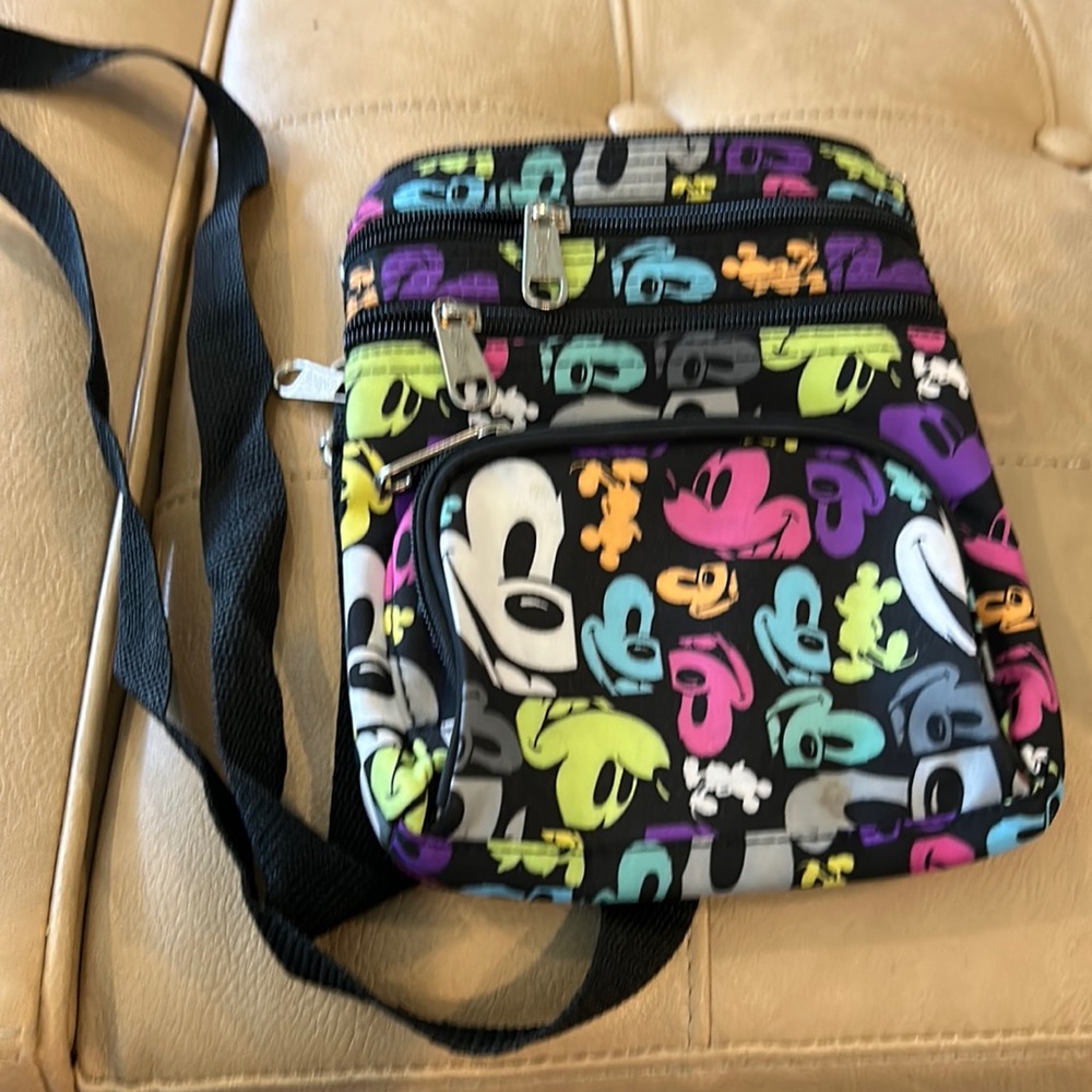Disney’s colorful Crossbody bag with three outside zipper compartment